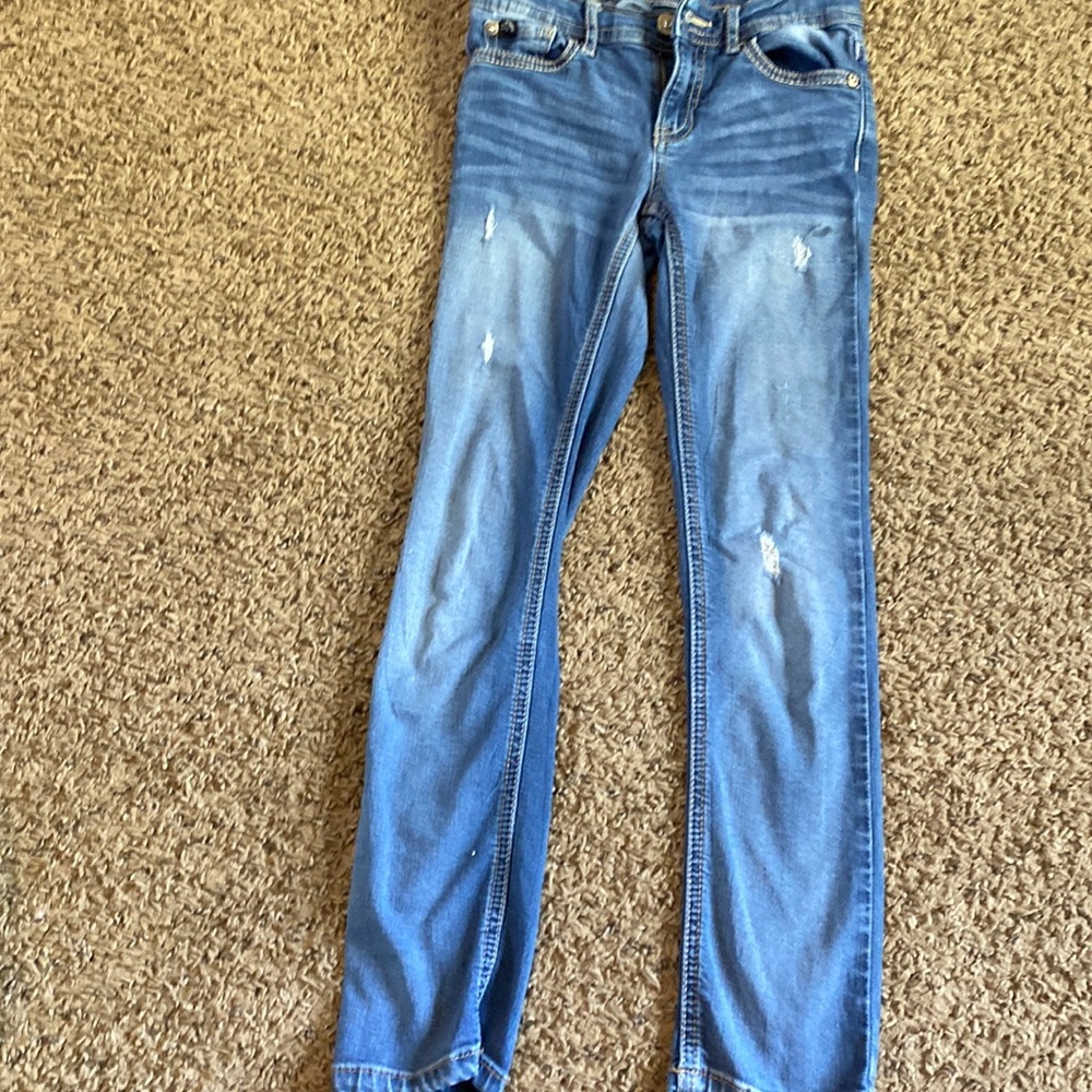 Jordache (Dillard’s) blue jeans small rips